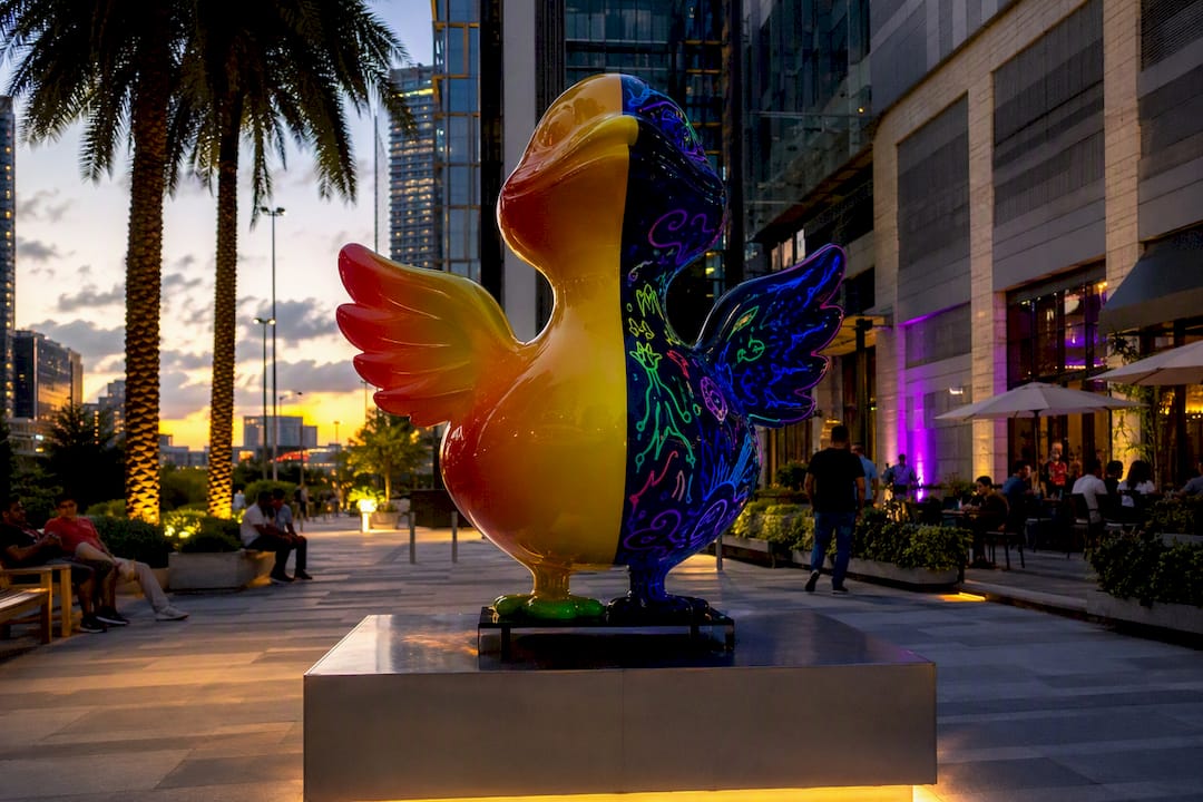 UV-reactive pop art sculpture showing daytime and blacklight effects
