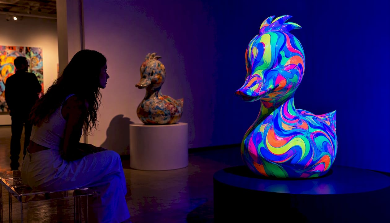 UV-reactive pop art sculpture glowing under blacklight