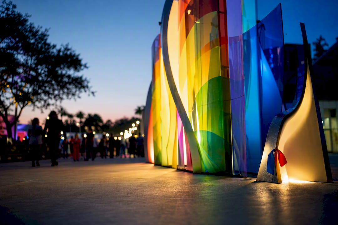 Pride sculpture glowing at outdoor event