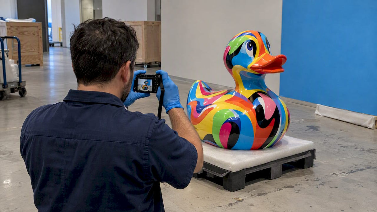 Registrar documents a colorful loaned sculpture