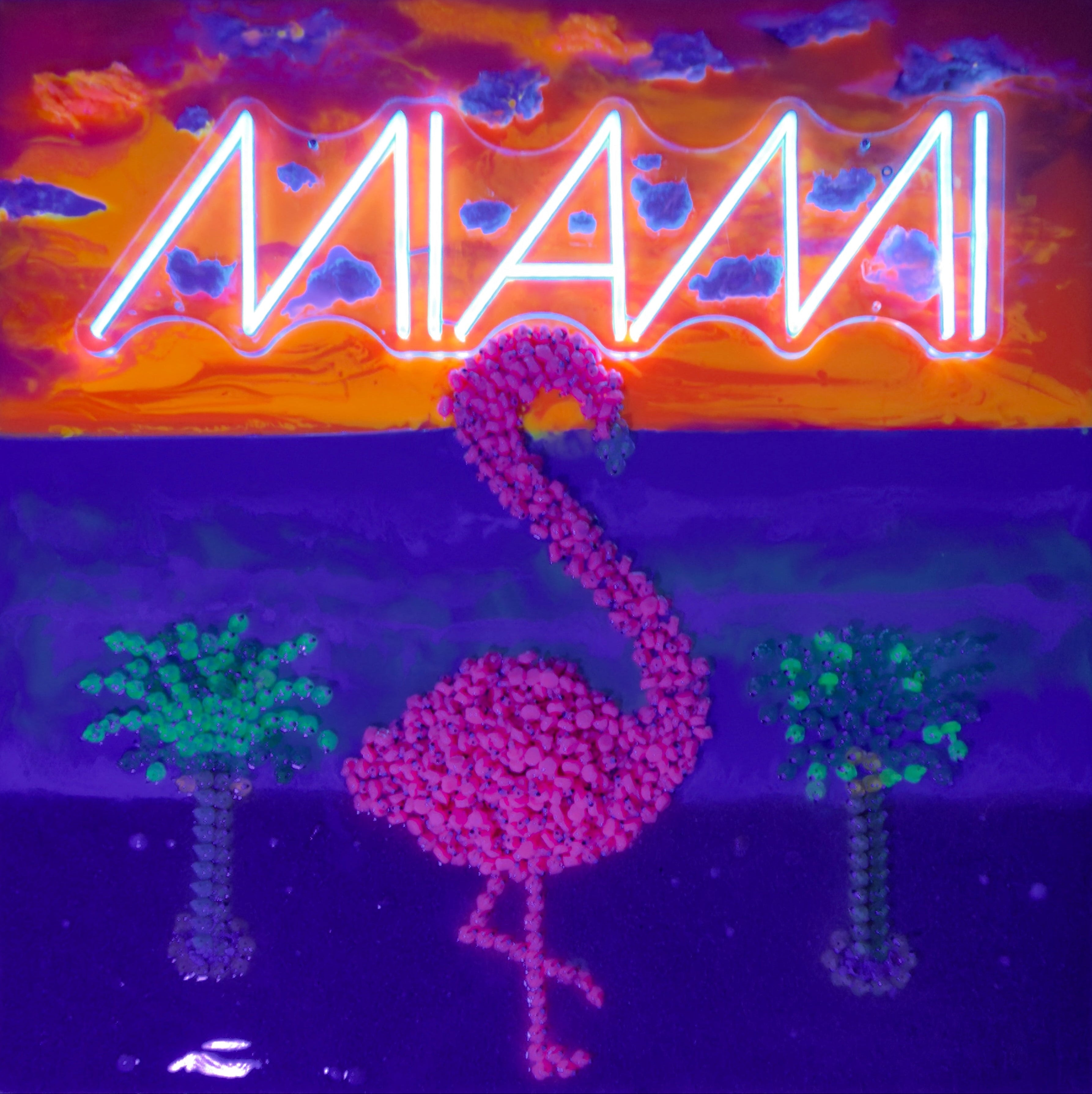 It's so Miami - pink flamingo, palms and neon MIAMI sign over a sunset, built from resin